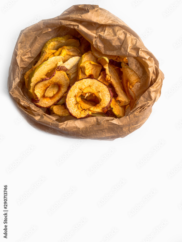 Tasty dried apples chips isolated on white background