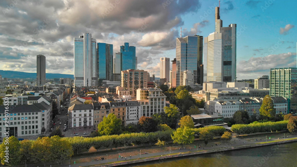 Frankfurt/Main Skyline Aerial Drone Shot At Sunset, view along the river