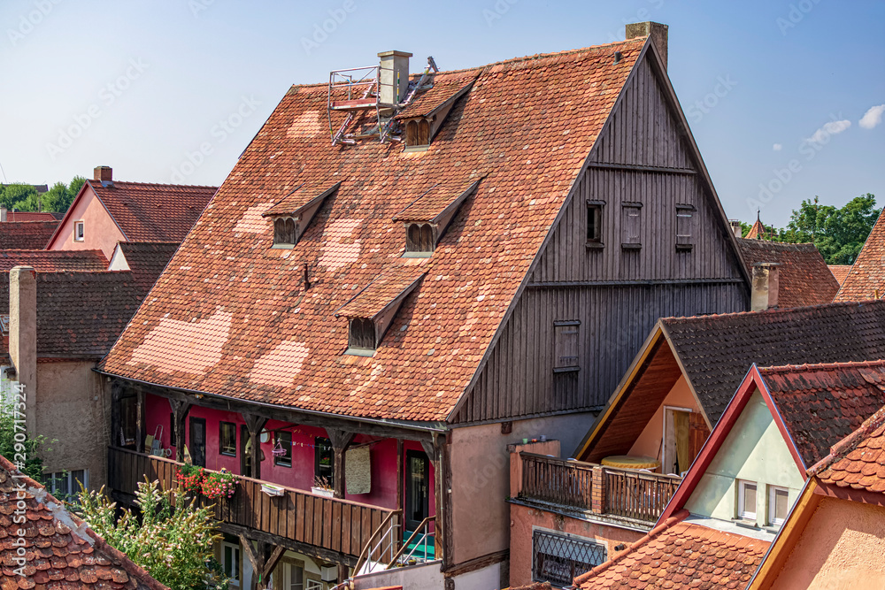 Typical wooden house in this beautiful romantic town surrounded by red roofs. Photograph taken in Rothenburg ob der Tauber, Bavaria, Germany.