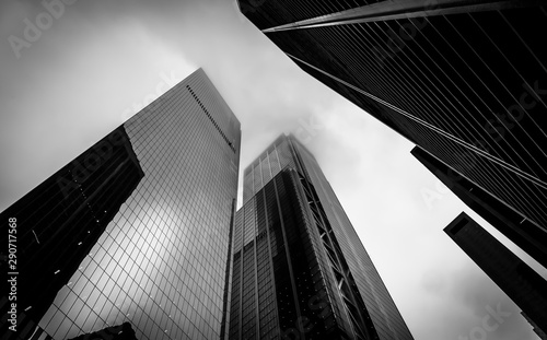 Black and white skyscraper during overcast day