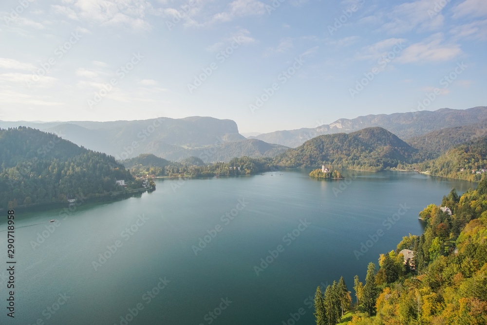 Travailing around Lake Bled In Slovenia an amazing lake full of impressive nature , crystal blue water with a beautiful island in the middle surrounded by those beautiful mountains and trees. Travailing around Lake Bled In Slovenia an amazing lake full of impressive nature , crystal blue water with a beautiful island in the middle surrounded by those beautiful mountains and trees.