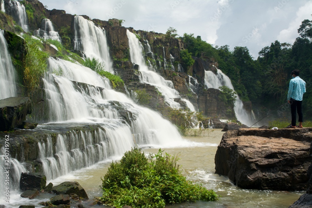Naklejka premium waterfall in forest