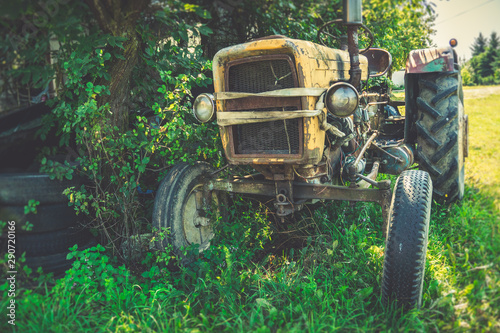 Old abandoned tractor, somwhere in the green nature photo