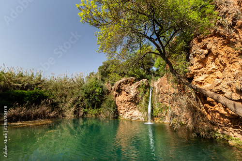 Pego do Inferno waterfall in Tavira, Portugal - Algarve Beautiful green lagoon