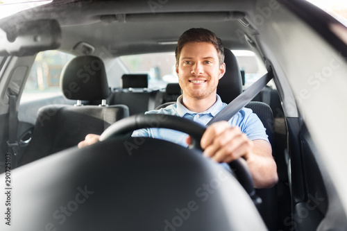 Tableau sur toile transport, vehicle and people concept - smiling man or driver driving car
