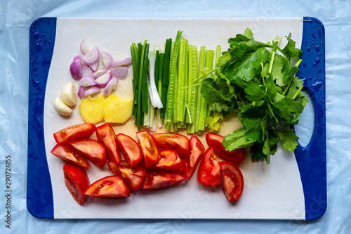 Colorful Fresh Vegetables On A Cutting Board photo
