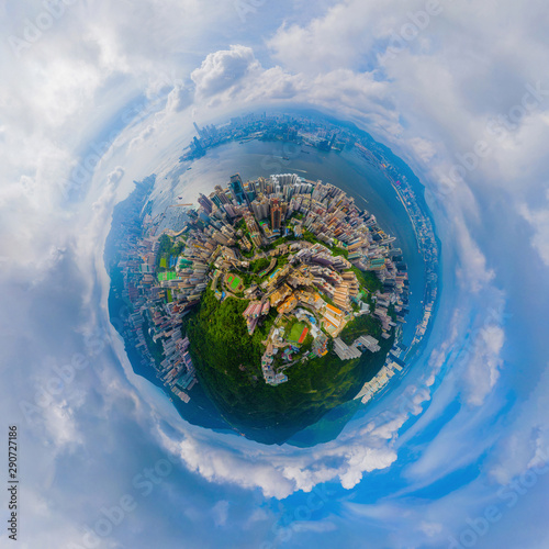 Fototapeta Naklejka Na Ścianę i Meble -  Little planet 360 degree sphere birds eye view. Panoramic view of aerial view of Hong Kong Downtown. Financial district and business centers in technology smart city. Skyscraper buildings at noon.