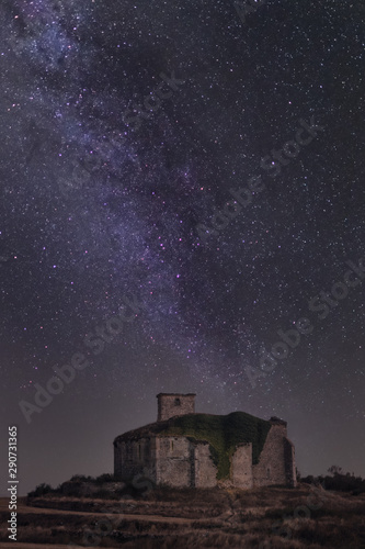 Ruined church at night with milky way