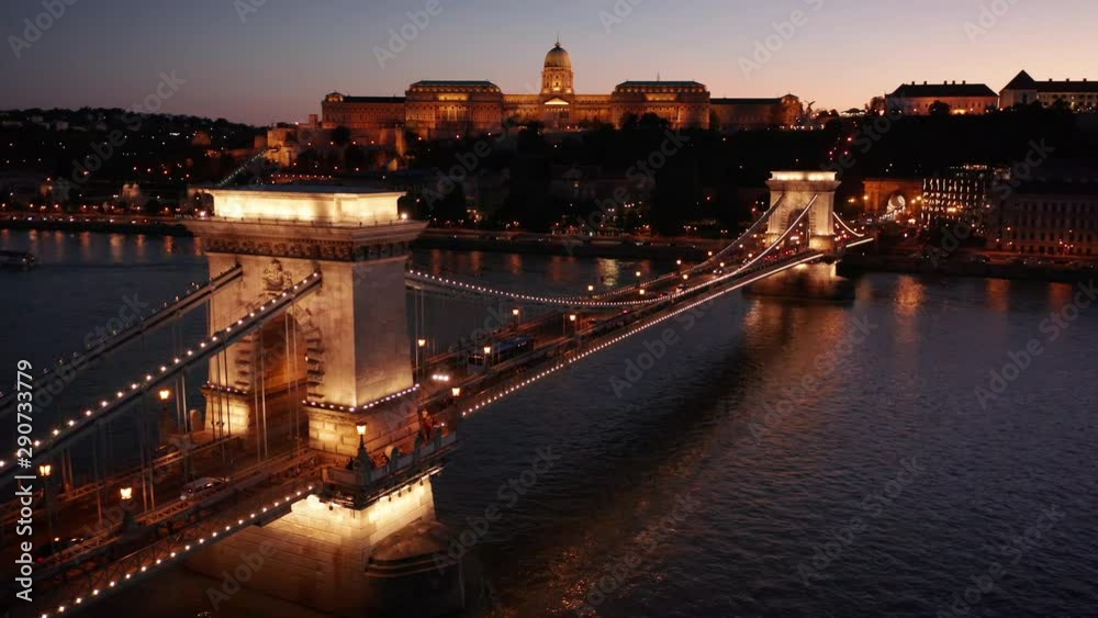 night flying left over Szechenyi Chain Bridge in Budapest