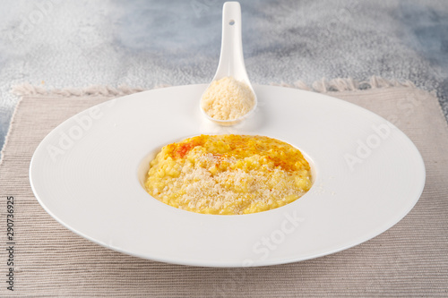 Risotto "Milanese" with saffron and parmesan cheese. Italian Cuisine