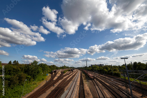 Blue sky over railroad tracks