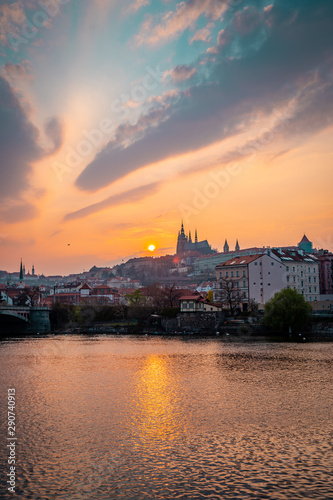 Scenic View of the Old Town Architecture with Vltava River, Charles Bridge and St.Vitus Cathedral in Prague, Czech Republic, Sunset Time
