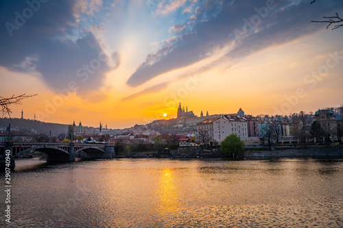 Scenic Panorama of the Old Town Architecture with Vltava River, Charles Bridge and St.Vitus Cathedral in Prague, Czech Republic, Sunset Time © toyechkina