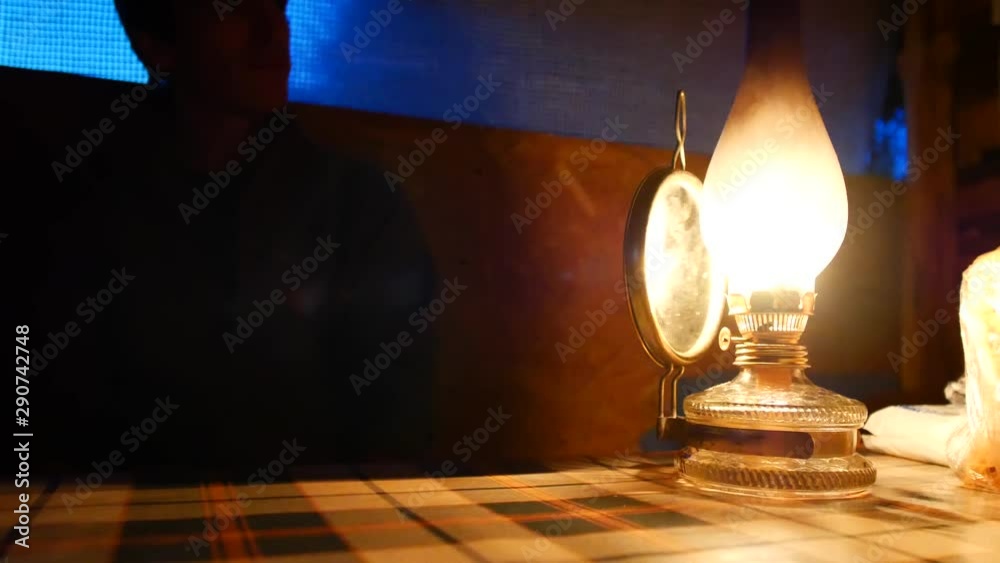 Old kerosene lamp on the table