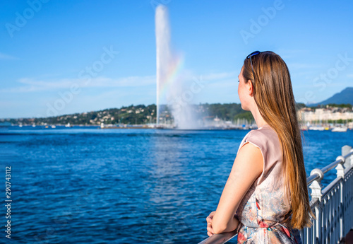 Woman enjoying beautiful view of the Geneva lake