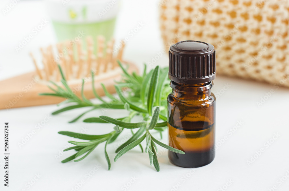 Small bottle with essential oil. Aromatherapy, spa and herbal medicine ingredients. Copy space Small bottle with essential oil. Aromatherapy, spa and herbal medicine ingredients. Copy space