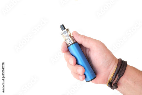 Titolo: Human hand with bracelets holding an azure blue electronic cigarette loaded with nicotine liquid