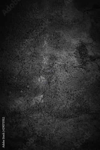 Black rugged background.Grunge texture.