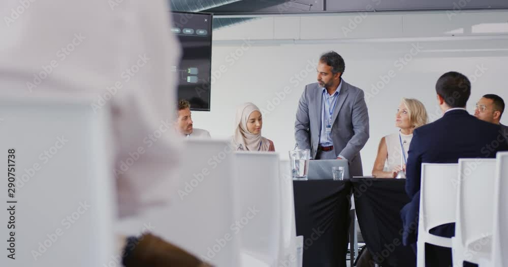 Businessman speaking at a conference Businessman speaking at a conference