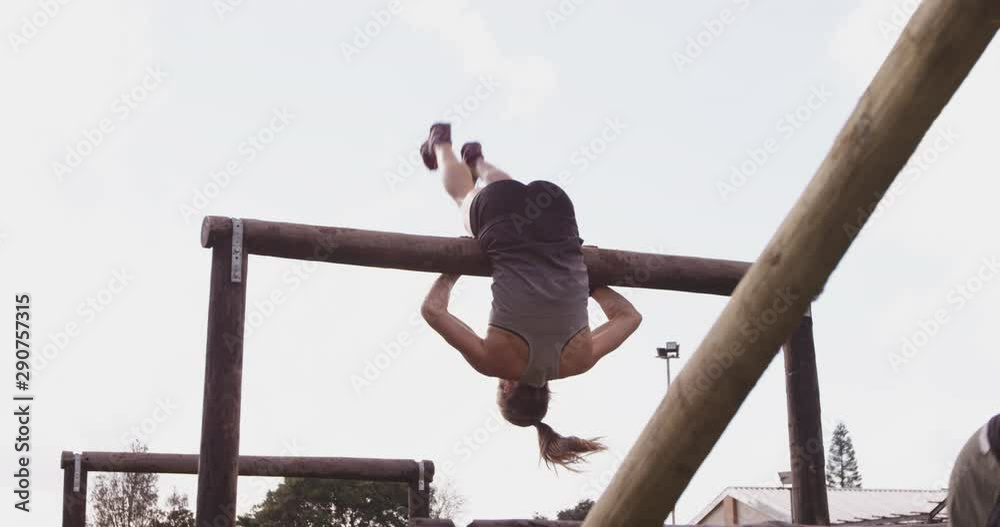 Young women training at an outdoor gym bootcamp Young women training at an outdoor gym bootcamp