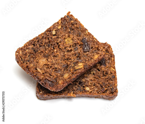 Rye bread with raisins on a white background. Phyto for slimming bread. © Prikhodko