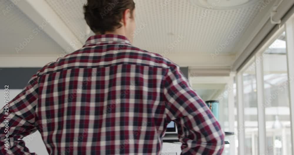 Young man working in a creative office Young man working in a creative office
