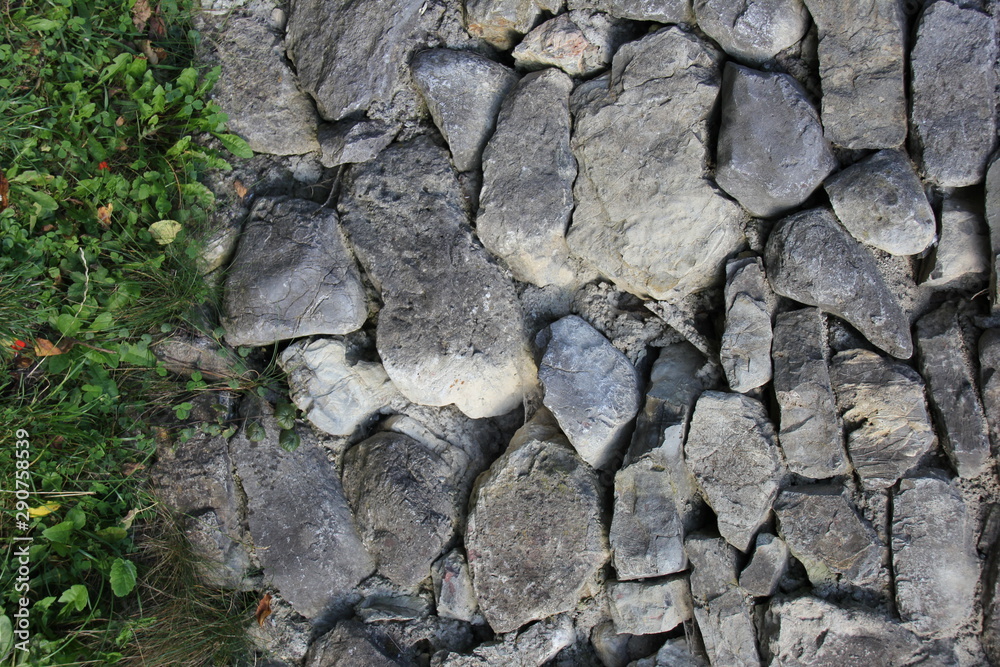 Natural stone background. Stones and grass. top view