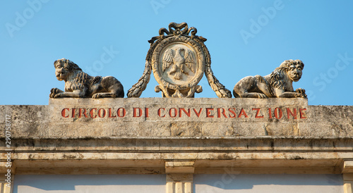 Old baroque sign in Ragusa Ibla, Sicily. The meaning is "Conversation Club".