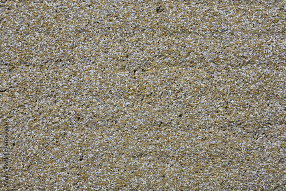 Wall of small gray pebbles. Texture. Background. Wall of small gray pebbles. Texture. Background.
