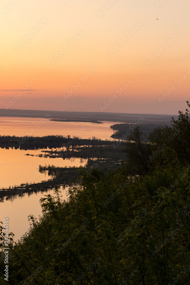 Obraz premium evening sunset on the river