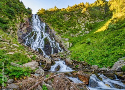 Majestic view of Balea Cascada waterfall in Fagaras mountains  Romania