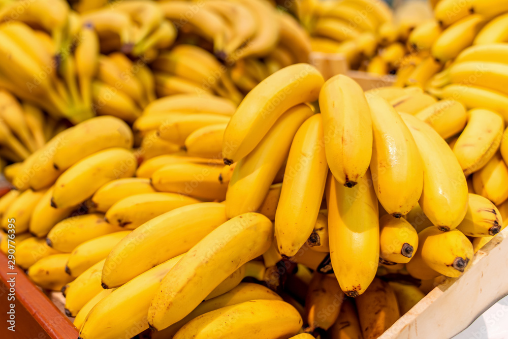 Macro Photo food tropical fruit bananas. Texture background yellow bananas in the peel. Product Image Tropical Fruit Yellow Bananas