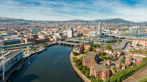 Aerial view on river and buildings in City center of Belfast Northern Ireland. Drone photo, high angle view of town  photo