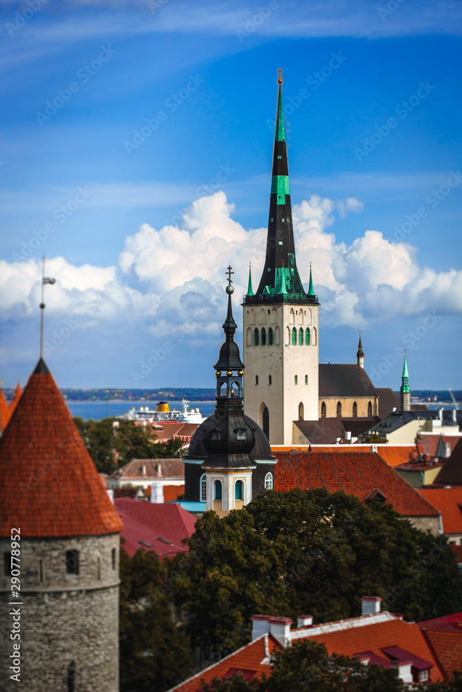 Scenic summer aerial panorama of the Old Town architecture in Tallinn, Estonia, Cloudy blue sky