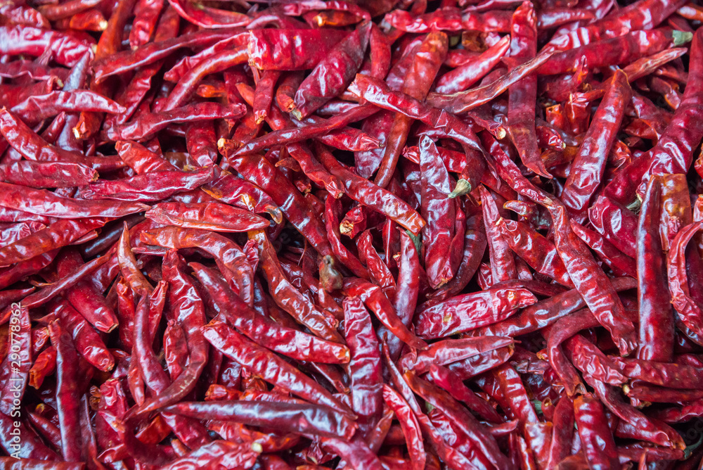 closeup red dried chili peppers, Cayenne pepper, chili spur pepper, long fed pepper , background red chili closeup red dried chili peppers, Cayenne pepper, chili spur pepper, long fed pepper , background red chili