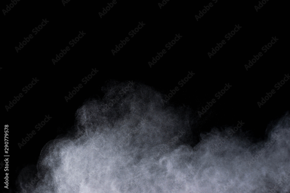 White powder explosion isolated on black background White powder explosion isolated on black background
