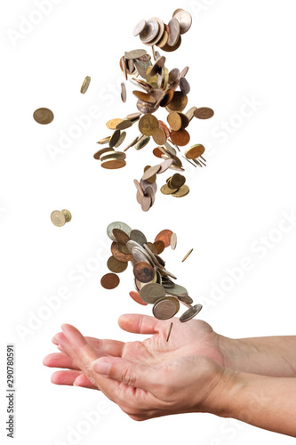 Coins falling down in the palm of a hand © Luka