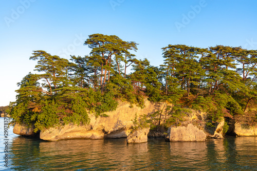 Matsushima Bay in dusk, beautiful islands covered with pine trees and rocks. One of the Three Views of Japan, and is also the site of the Zuigan-ji, Entsu-in and Kanrantei. in Miyagi Prefecture, Japan photo