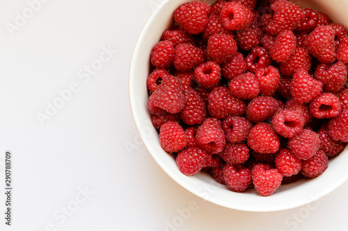 Raspberries in a plate.