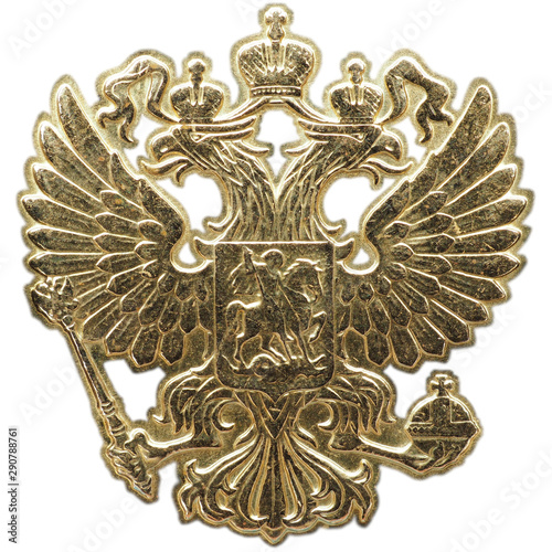 National emblem of the Russian Federation of the yellow metal. Fragment of a coin close up. Isolate