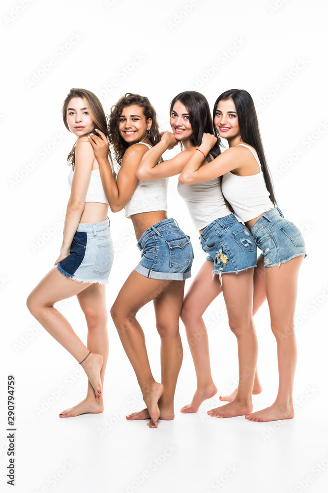 Group of four sexy young happy girls isolated on white background Group of four sexy young happy girls isolated on white background