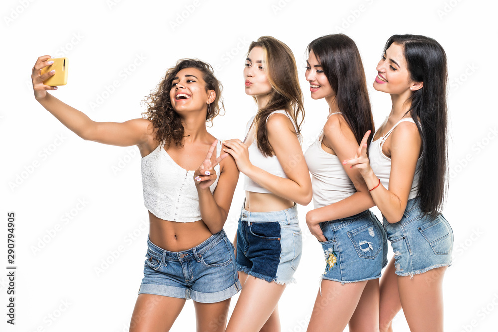 Young beauty women wear shirts and shorts selfie on phone isolated on white background Young beauty women wear shirts and shorts selfie on phone isolated on white background