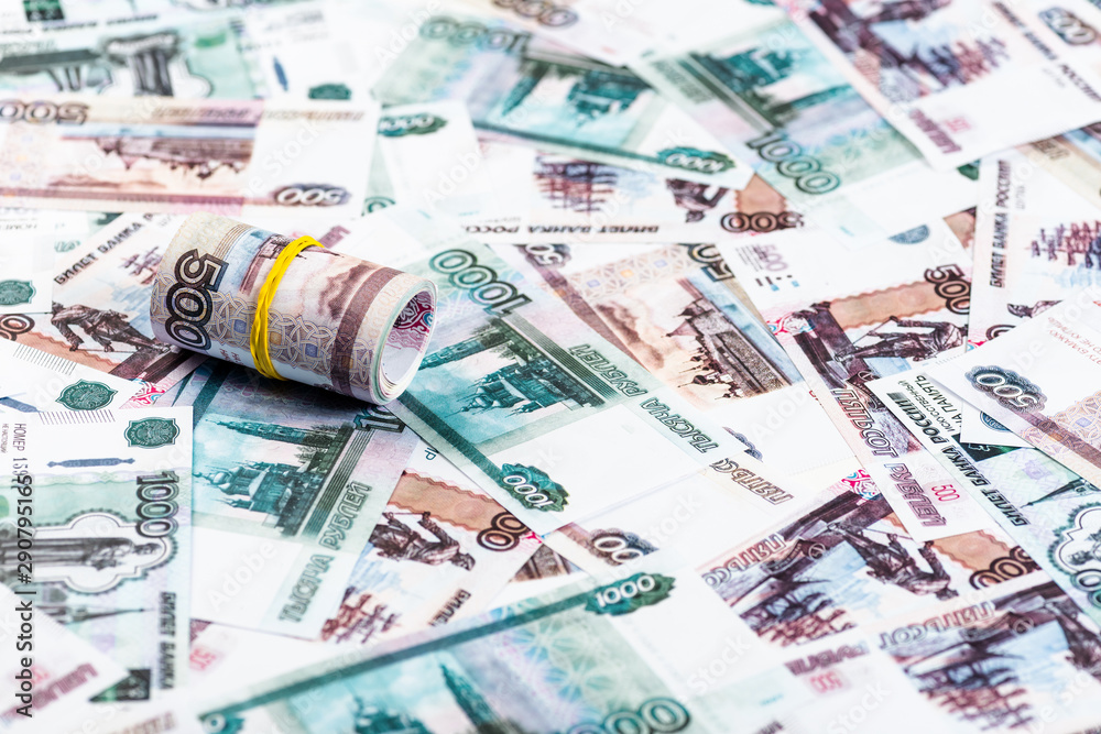 selective focus of cash roll on russian banknotes selective focus of cash roll on russian banknotes