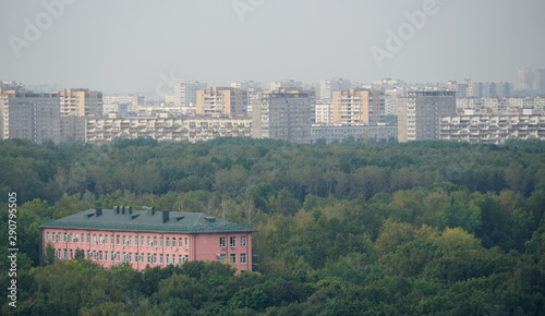 Photography Moscow cityscape. Urban houses against gray sky at dawn.