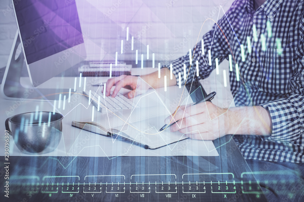 Double exposure of stock market chart with man working on computer on background. Concept of financial analysis. Double exposure of stock market chart with man working on computer on background. Concept of financial analysis.