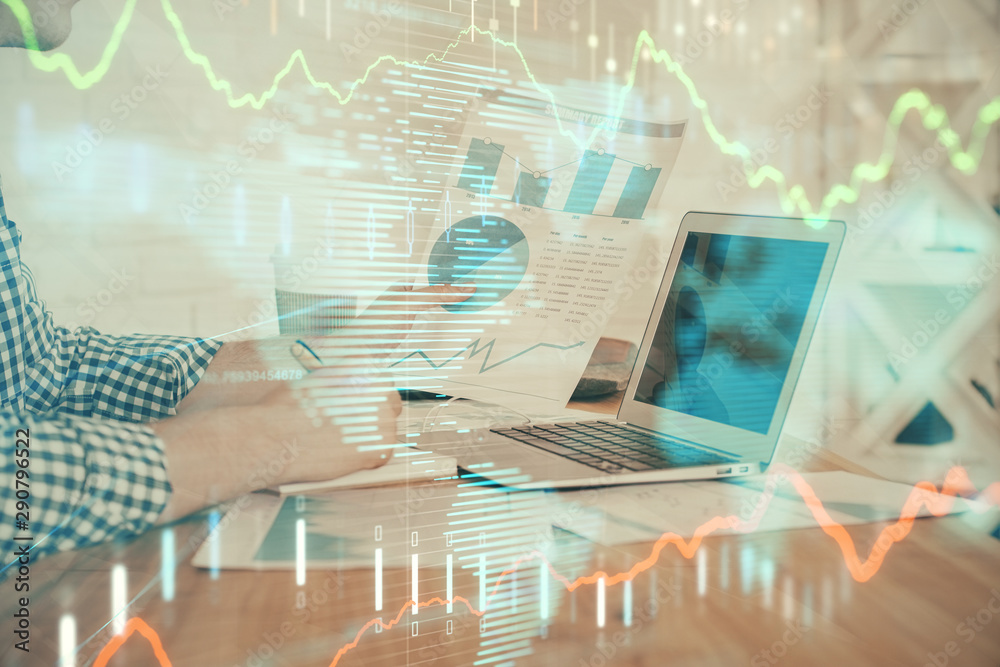 Double exposure of financial graph with man works in office on background. Concept of analysis. Double exposure of financial graph with man works in office on background. Concept of analysis.