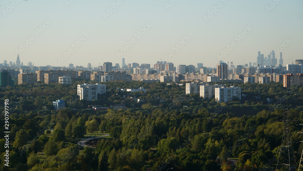 Moscow cityscape. Urban houses against gray sky at dawn.