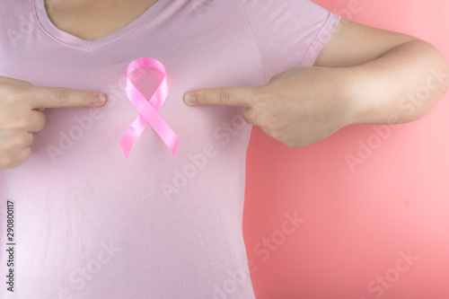 Wallpaper Mural Healthcare, medicine and breast cancer awareness concept. Closeup on woman chest with pink breast cancer awareness ribbon. Torontodigital.ca