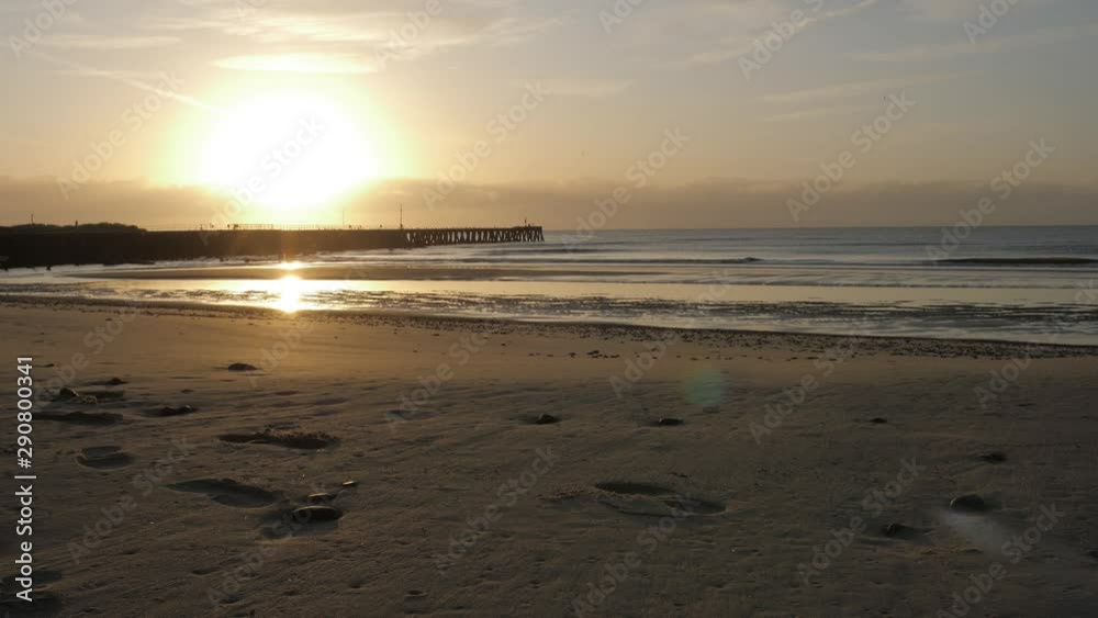 Man running on the beach at sunrise slow motion 4K Man running on the beach at sunrise slow motion 4K