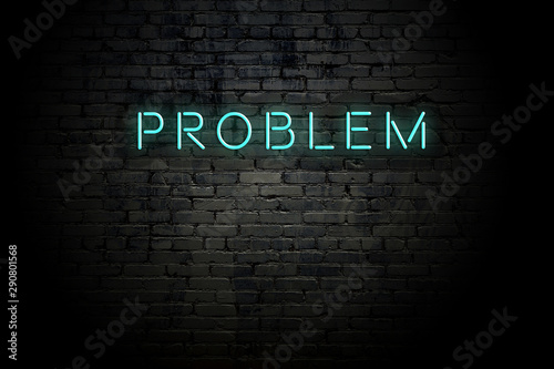 Highlighted brick wall with neon inscription problem photo